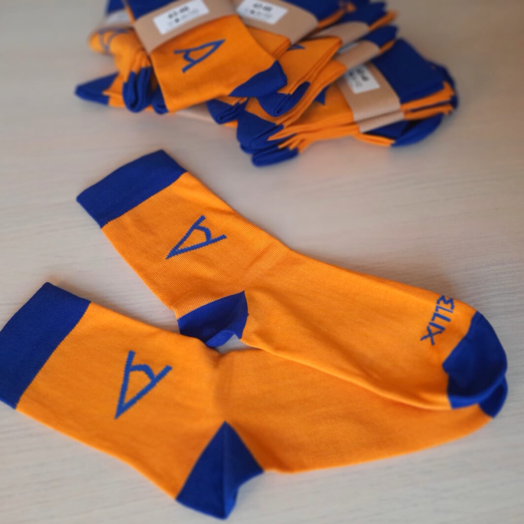 Bunte Socken mit Logo IT-Unternehmen