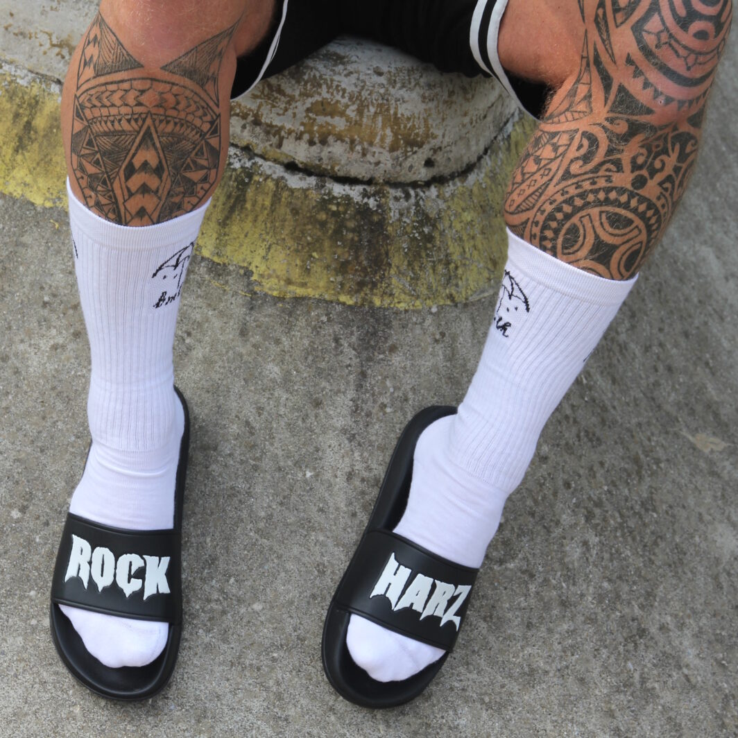 Badelschlappen Merch-Kollektion Rock-Festival