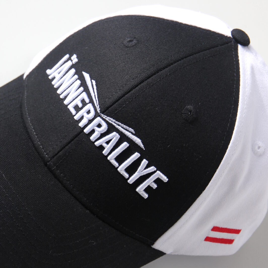 Schwarz-weiße Baseballcap mit 3D-gesticktem Logo und Österreich-Flagge